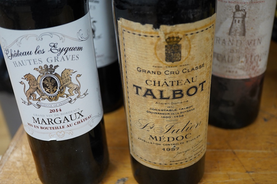 Eleven bottles of red wine including; Grand Vin du Chateau Latour 1973, Chateau Lafite Rothschild 1965, Chateau Talbot Medoc 1957, four bottles of Chateau les Eyquem Margaux 2014, two bottles of Chateau Cissac 1976, etc.